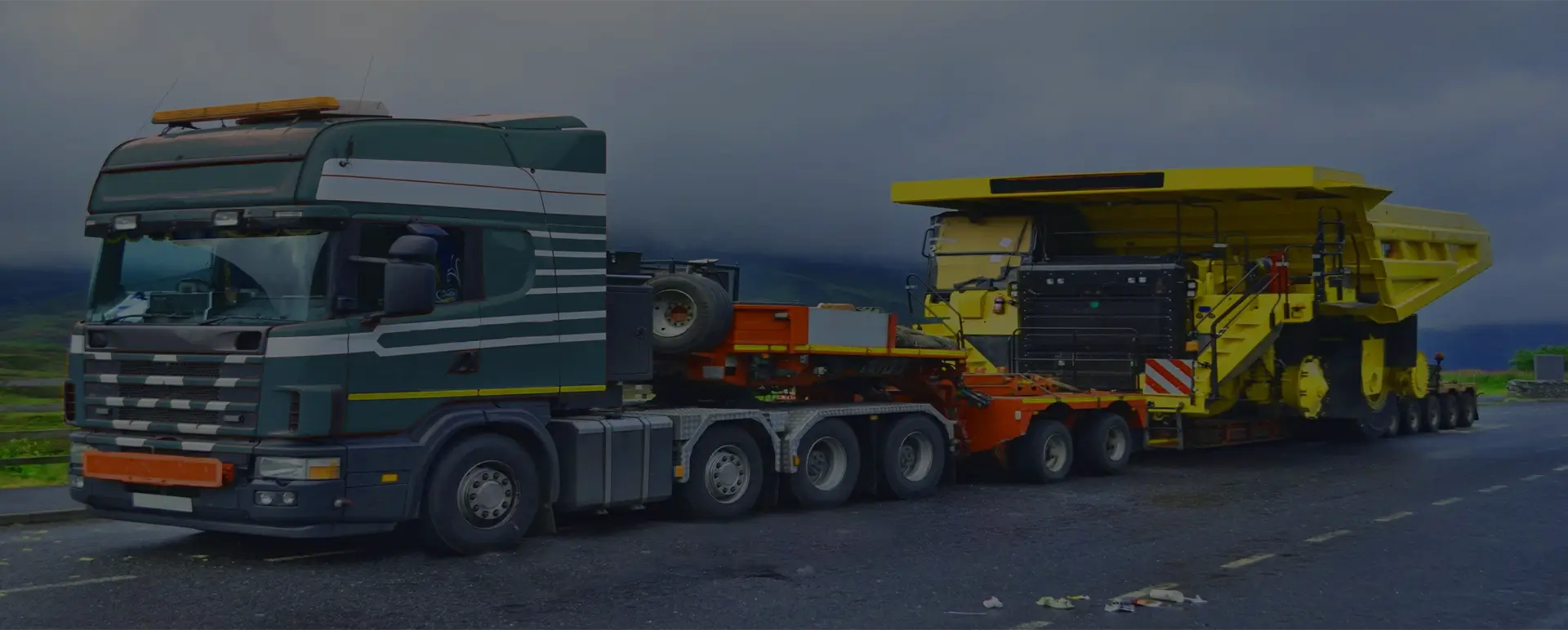 Низкорамный трал для перевозки белаза по России из Подольска с полным сопровождением 24/7